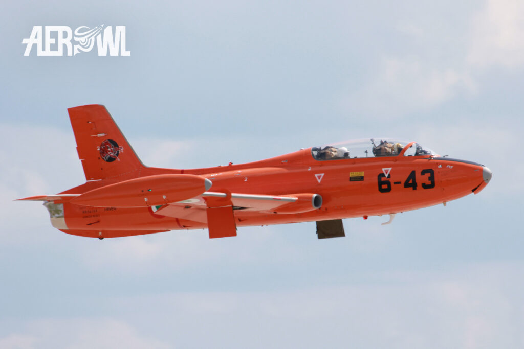 An orange painted Aermacchi MB-326E of the Italian Air Force starting during the ILA 2018 at the BER-Berlin Brandenburg Airport in Germany.