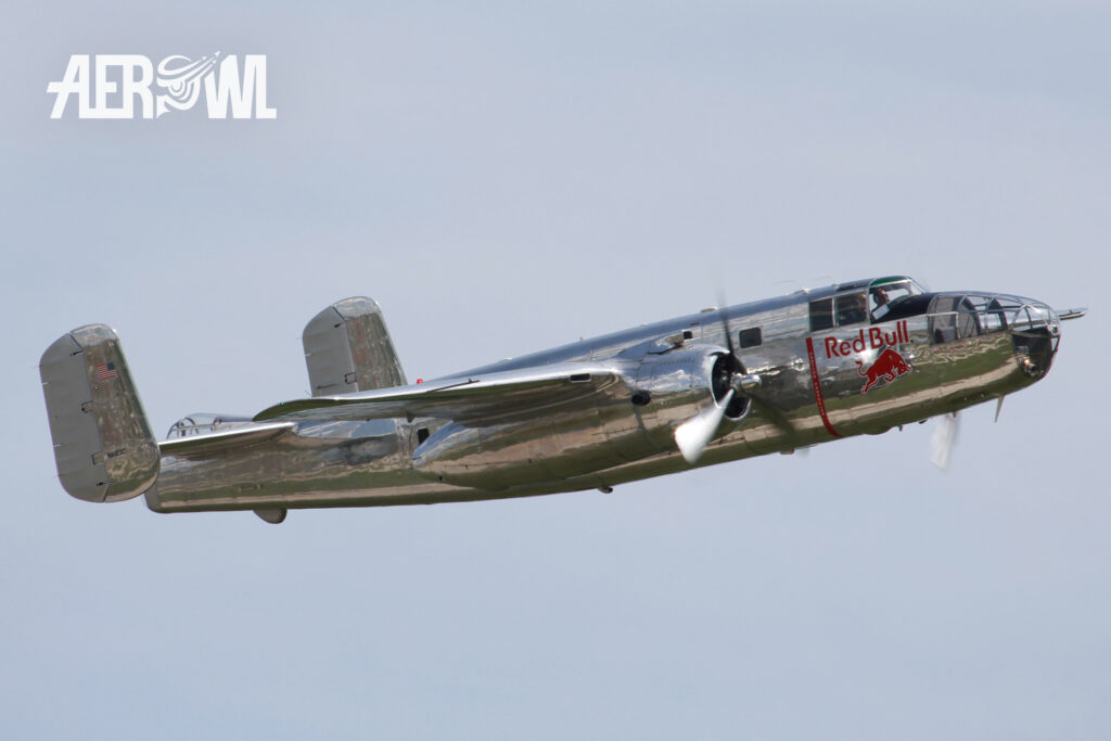 The famouse Red Bull North American B-25J "Mitchell" (N61123C) at the ILA 2014 Piloted by Raimund Riedmann over the BER airport Berlin-Brandenburg in Germany.