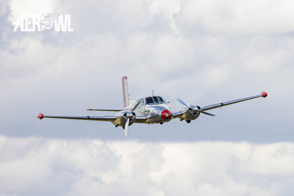 Beechcraft Model 50 Twin Bonanza fly by during the Stearman&Friends 2024 over the Bienenfarm near Berlin, Germany.