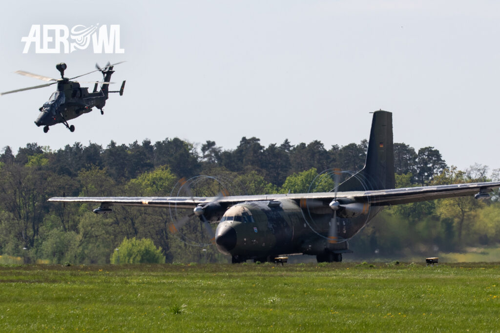 Transall C-160 with beautiful wake vortices on the propellers and a Eurocopter Tiger PAH Helicopter as back up start during the ILA 2018 at the BER airport in Berlin/Brandenburg, Germany.