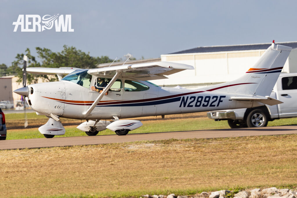 A white 1966 Cessna 182 Skylane rolling towards start during the Sun´n Fun 2025 in Lakeland, Florida.