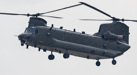 A Royal Air Force Boeing-Verol CH-47 Chinook air display during the ILA 2022 at the BER airport Berlin-Brandenburg in Germany.