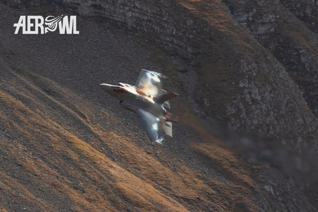 An Italian Air Force Lockheed Martin F-35A Lightning II makes a hard turn during the Axalp 2022 over the Ebenfluh in the Swiss mountains.