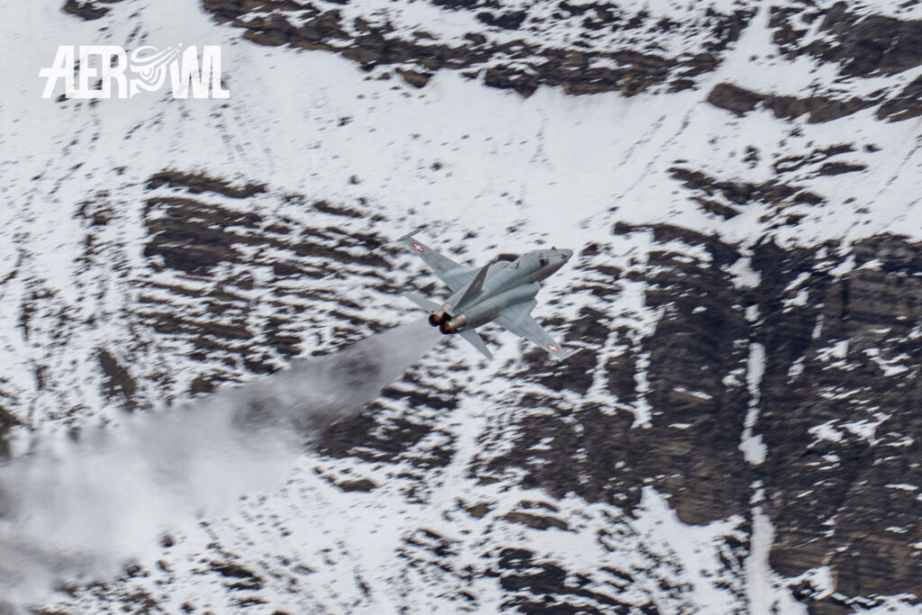 A Northrop F-5E-Tiger II of the Swiss Air Force with afterburner at the Axalp Fliegerschiessen 2018 in the Swiss Alps.