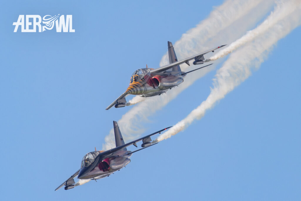 Two beautiful colored Alpha Jets of the Flying Bulls Fixed Wing Formation at the AirPower24 over the Hinterstoisser air base in Austria.
