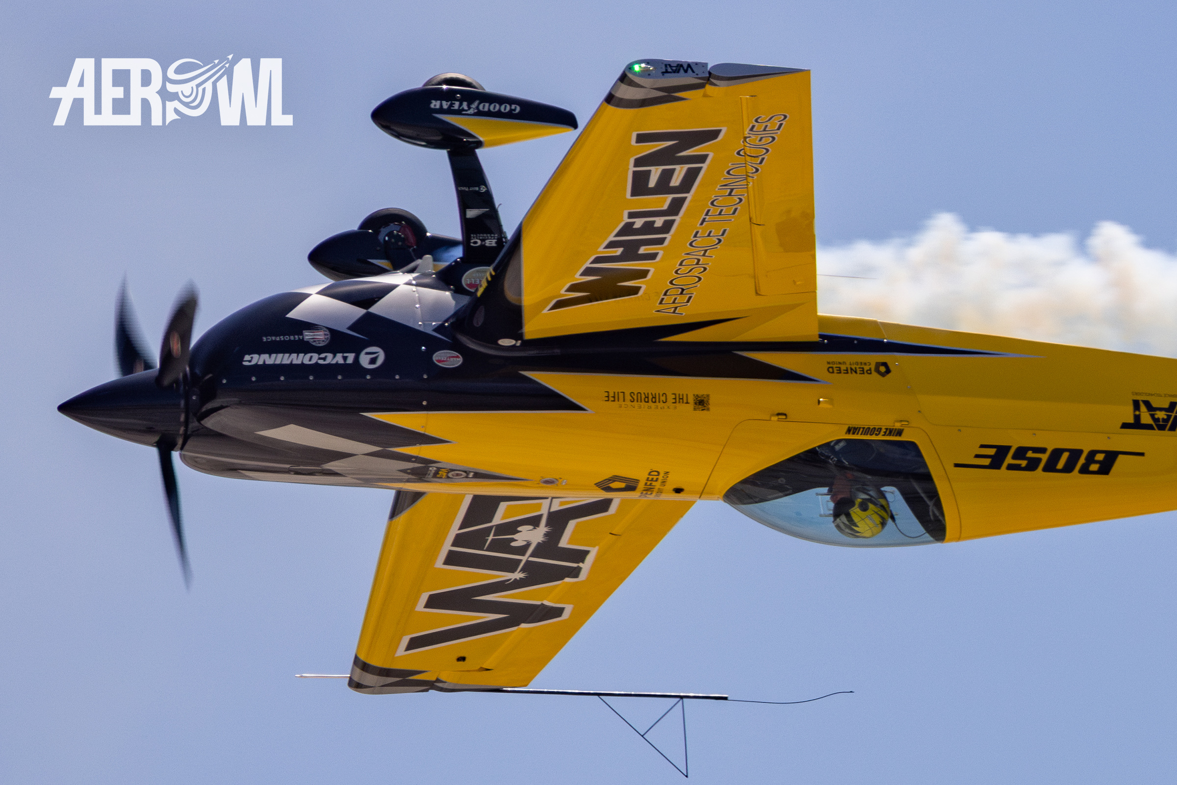 Michael Goulian during the NAS Key West Southernmost Air Spectacular 2025 in Florida in his black and yellow Extra 330SC plane.