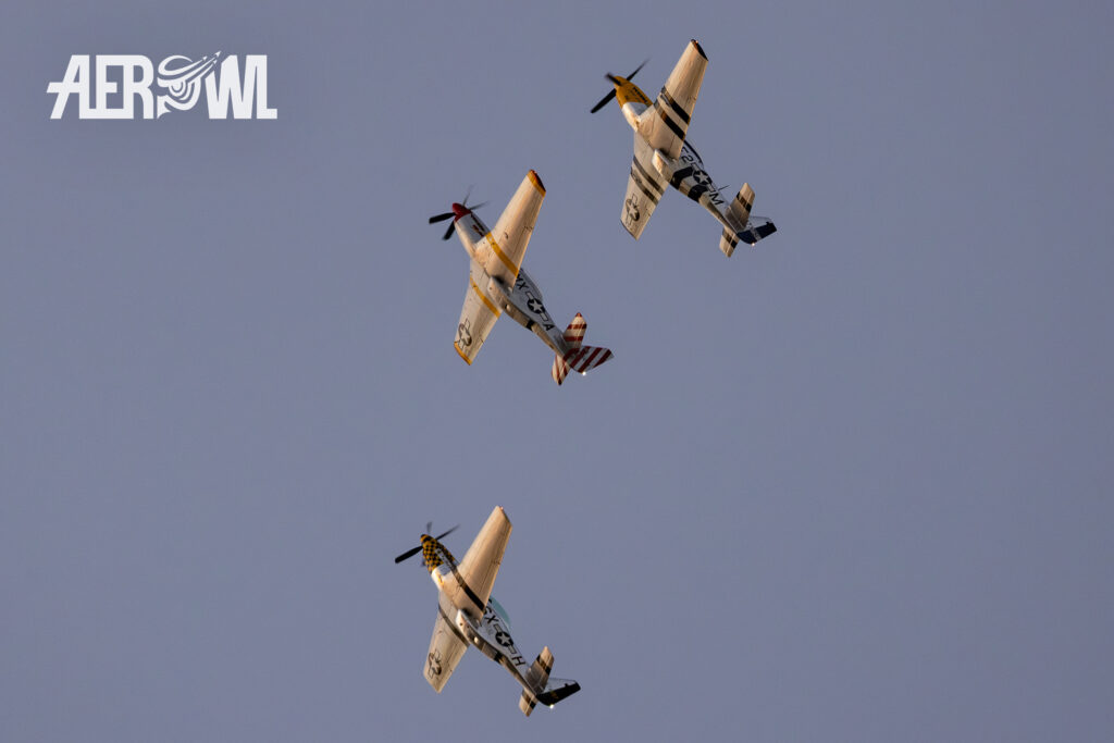 North American P-51 "Mustang" "Cheryl Lynn" , "Mad Max" and "The little witch" performing a looping during the Sun´n Fun 2025 in Lakeland, Florida.