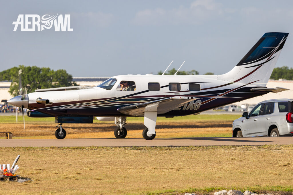 A elegant Piper PA-46 taxiing towards the runway at Sun'n Fun 2025 in Lakeland, Florida.