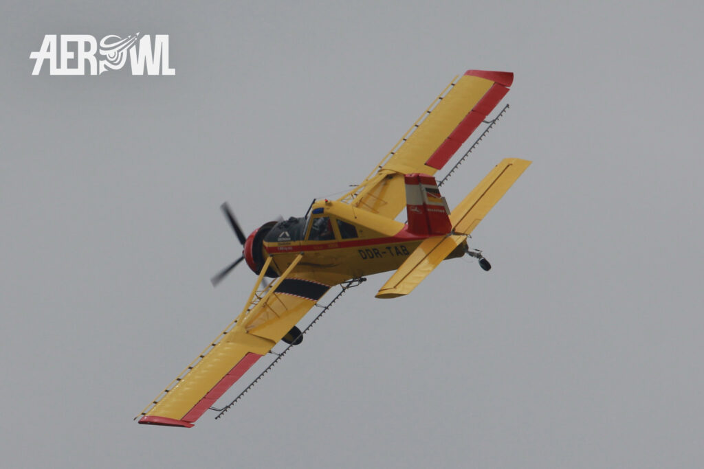 A PZL-106 Kruk air display at the ILA 2014 over the runway of the BER airport Berlin-Brandenburg in Germany.
