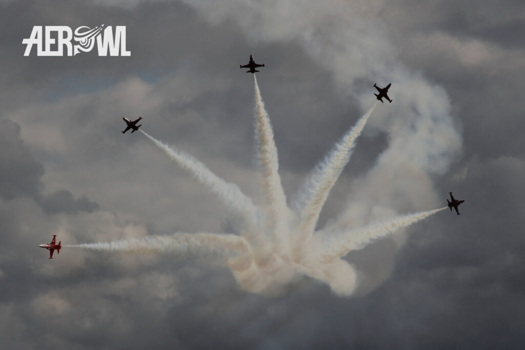 The Turkish Stars in their Canadair NF-5A Freedom Figther (licenced version of Northrop) during the final split at the ILA 2014 over the audience at the BER airport Berlin/Brandenburg in Germany.