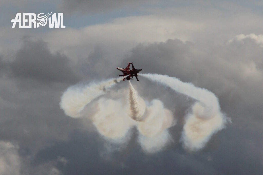 Interesting moment of the Turkish Stars in their Northrop NF-5A Freedom Fighter during the ILA 2014 over the BER airport in Berlin/Brandenburg, Germany.